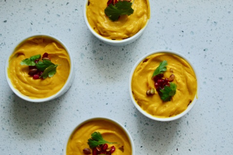 Creamy roasted squash in white ramekins