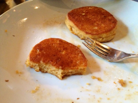One and a half pancake on a white plate