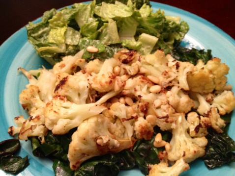Roasted Cauliflower and Caesar Salad on a light blue plate