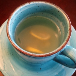 Ginger tea in a light blue cup