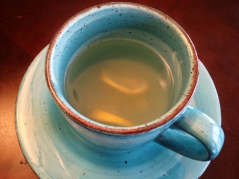 Ginger tea in a light blue cup