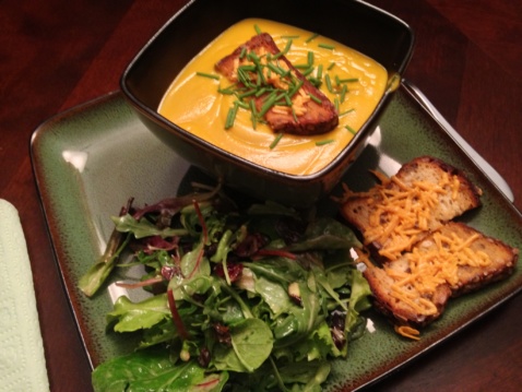 Creamy acorn squash soup with cheesy croutons, and a green salad