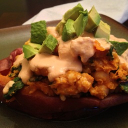 Yam boats with chickpeas, chard and spicy cashew cream sauce