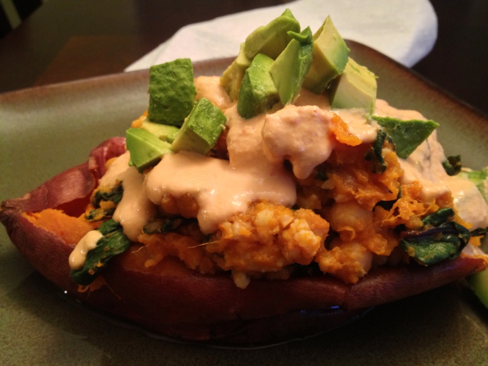 Yam boats with chickpeas, chard and spicy cashew cream sauce