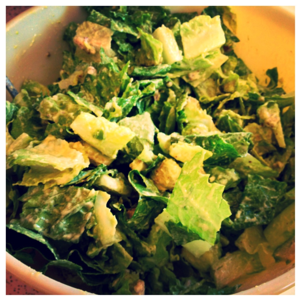 Vegan Caesar salad in a white bowl