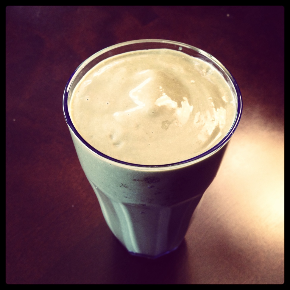 A vegan protein milkshake in a glass