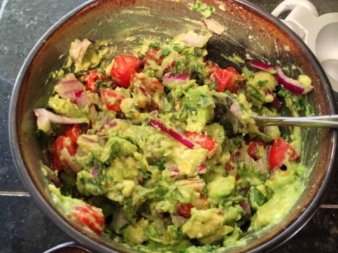 Guacamole in a brown bowl