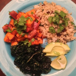 Sweet potatoes, quinoa pilaf, and greens on a light blue plate