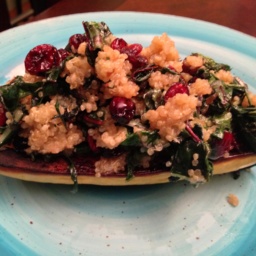 Stuffed delicata squash boats with quinoa, kale and cranberry pilaf