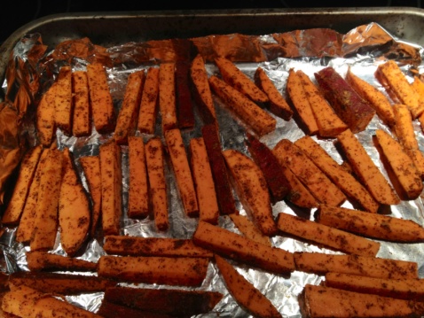 Sweet potato wedges on a baking sheet