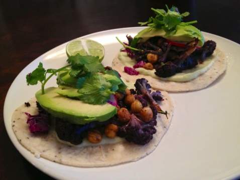 Two tacos with cauliflower, chickpeas and avocado