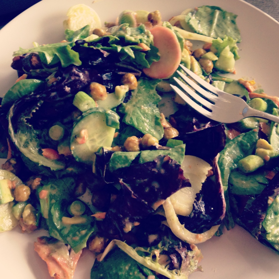 Green salad on a white plate