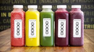 Five juice bottles from Kimberly Synder’s Glow Bio Cleanse