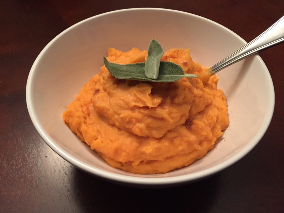 Sweet potato mash garnished with greens