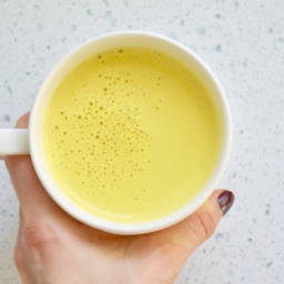 Turmeric latte in a white cup