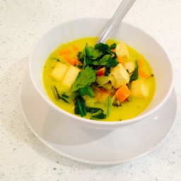 Coconut curry with tofu, carrots, broccolini and greens