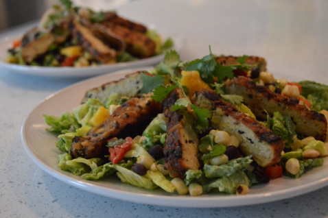 A Mexican Fiesta salad with mango black bean salsa