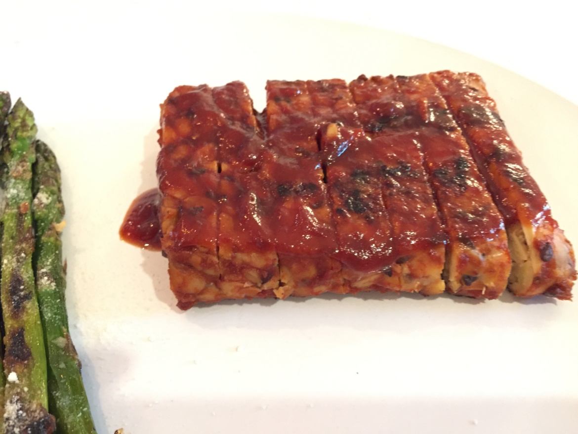 Tempeh BBQ baby back ribs on a white plate