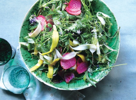 A spring green salad with quick pickled vegetables