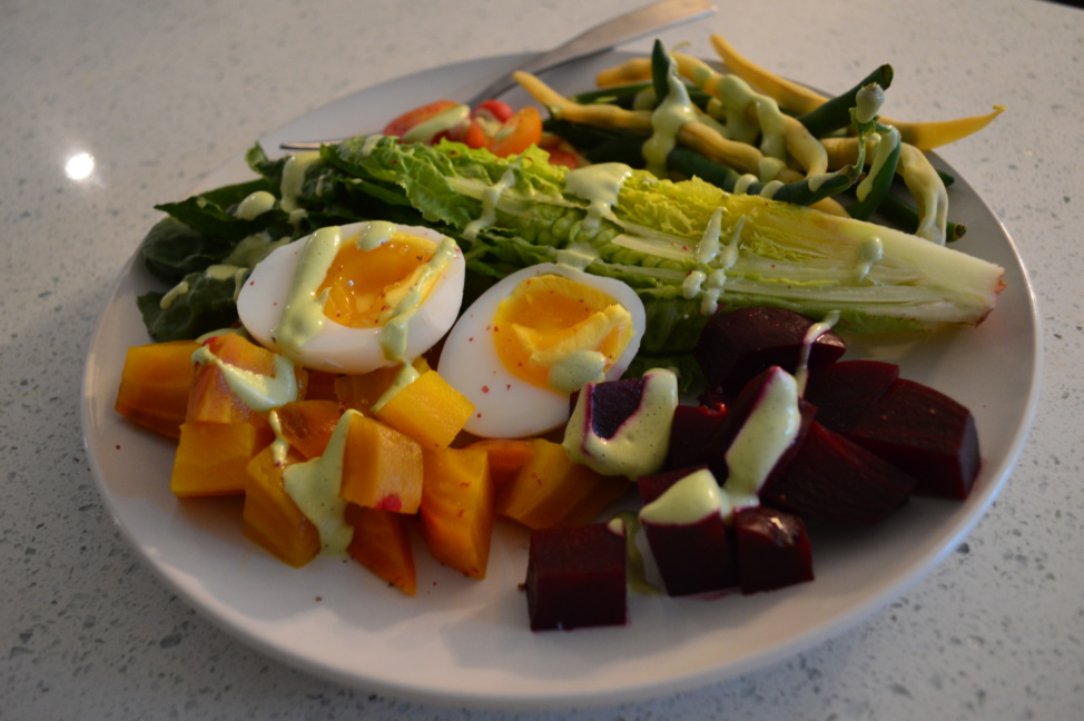 Nicoise salad with romaine, beets, eggs, and green beans