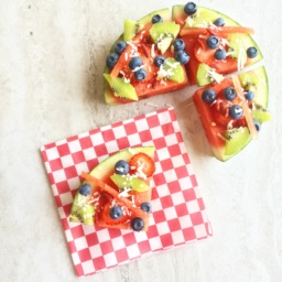 Watermelon pizza with kiwi, blueberries and strawberries