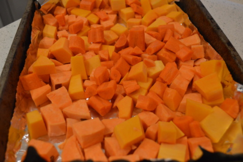 Chopped pumpkin on a baking tray