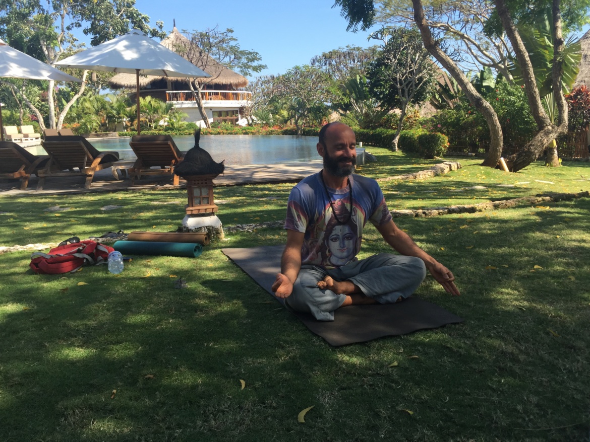 Practicing Pranayama breathing and meditation in Bali with our instructor