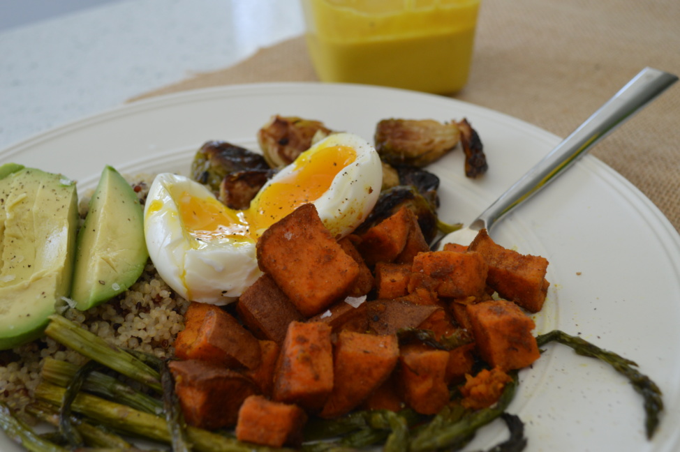 Sweet potatoes, quinoa, asparagus and avocado on a plate