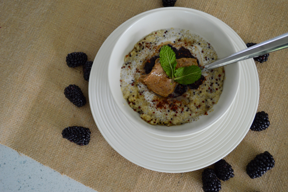 creamy coconut quinoa porridge with blueberry chia jam