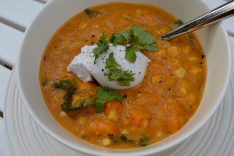 Sweet potato corn chowder in a white bowl