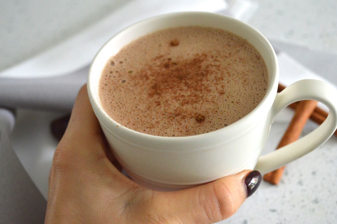 Homemade cashew milk mocha sprinkled with cinnamon
