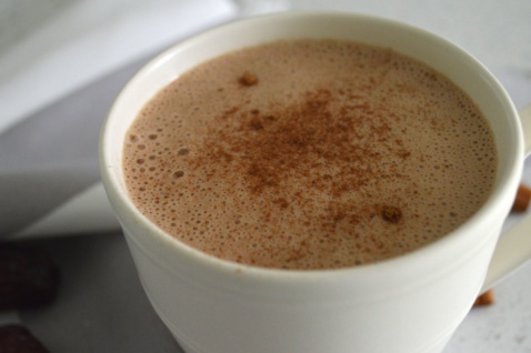 vegan mocha in a white cup