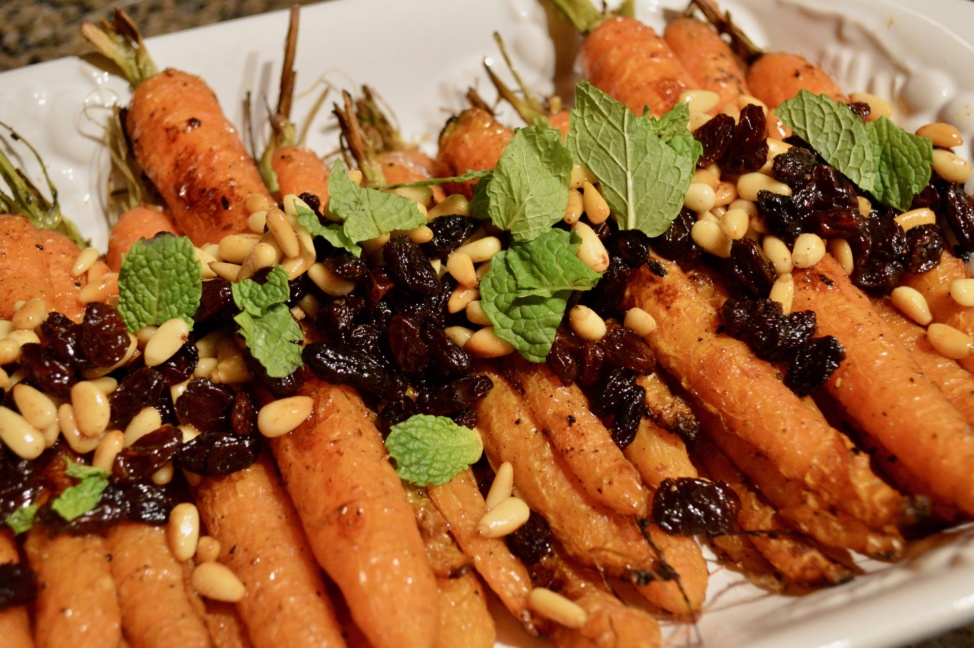 Roasted whole carrots with raisins and pine nuts