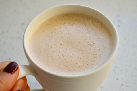 Bullet proof coffee with coconut butter, maca powder, and cashew nut milk