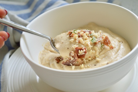 Roasted Cauliflower Bisque topped with almonds and cilantro