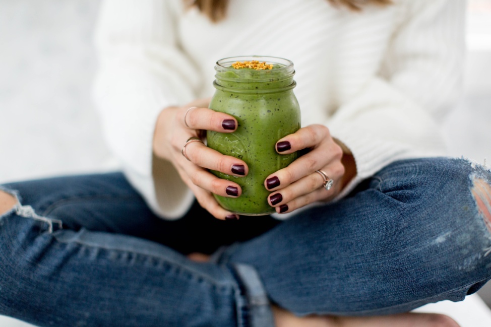 a green smoothie in a mason jar