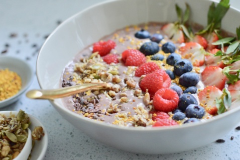 dairy-free creamy smoothie bowl with berries and seeds