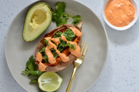 stuffed mexican sweet potato with avocado and kale