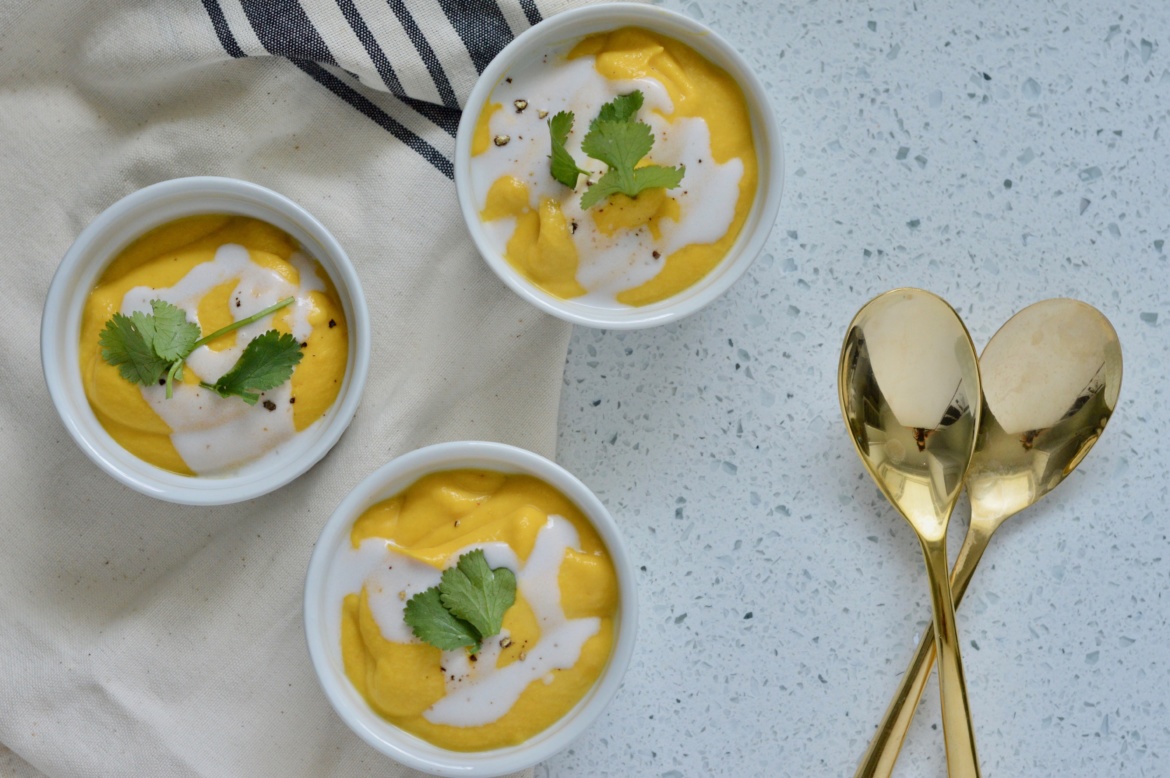 vegan, healthy spring soup in three white ramekins 