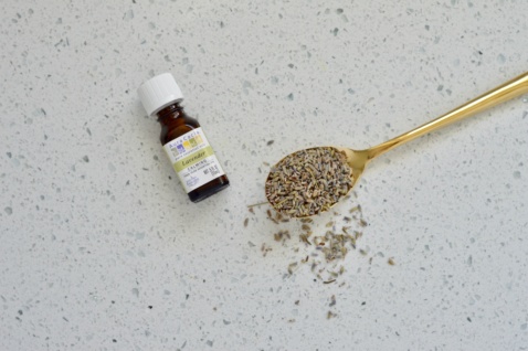 lavender essential oil and dried lavender flowers