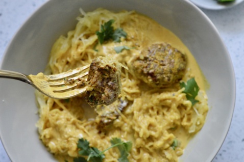 paleo lamb meatballs in a white bowl